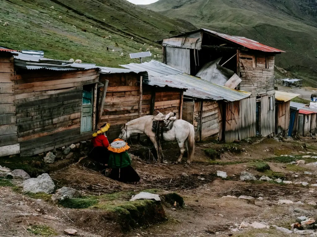Woman and her horse in the Andes mountains