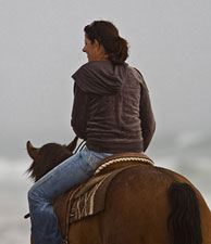 Woman riding a horse